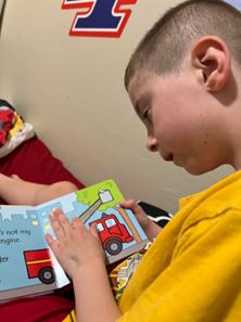 Boy reading a book Boy reading a book