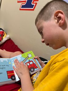 Boy reading a book