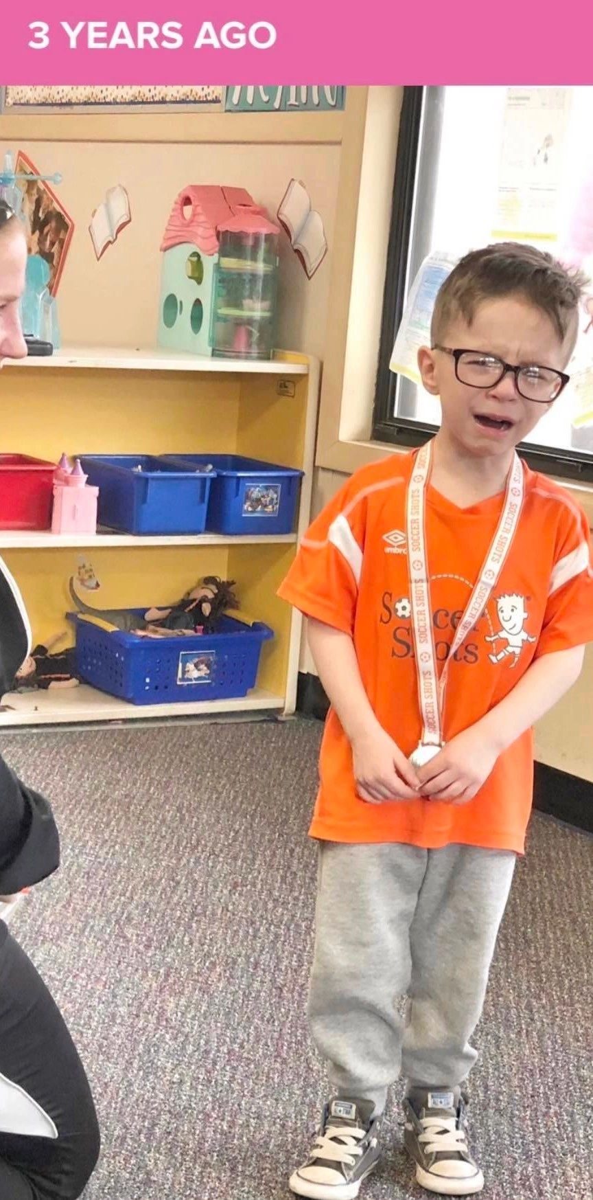 Photo of little boy upset in a classroom