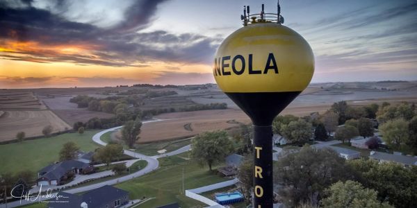 Aerial view of Neola water tower at sunset.