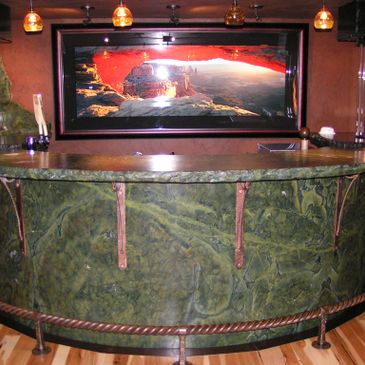 Extreme custom  stone bar with forged metal work.  Granite metal and fire. Made in Montana. ASMT