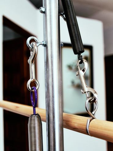 Close up of springs and a roll back bar