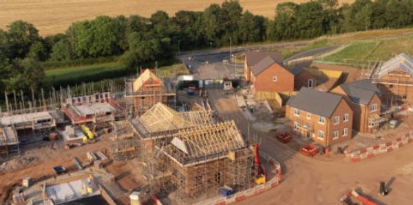 Aerial view of houses under construction.