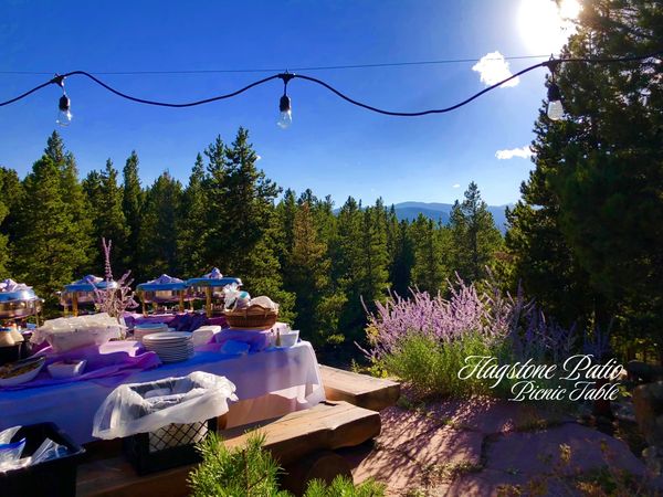 Flagstone Patio table seats up to 12 guests comfortably outdoors.