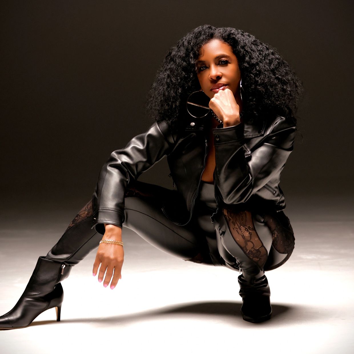 Tanaa Dean in all black leather