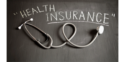 Stethoscope and chalkboard with "Health Insurance" text.