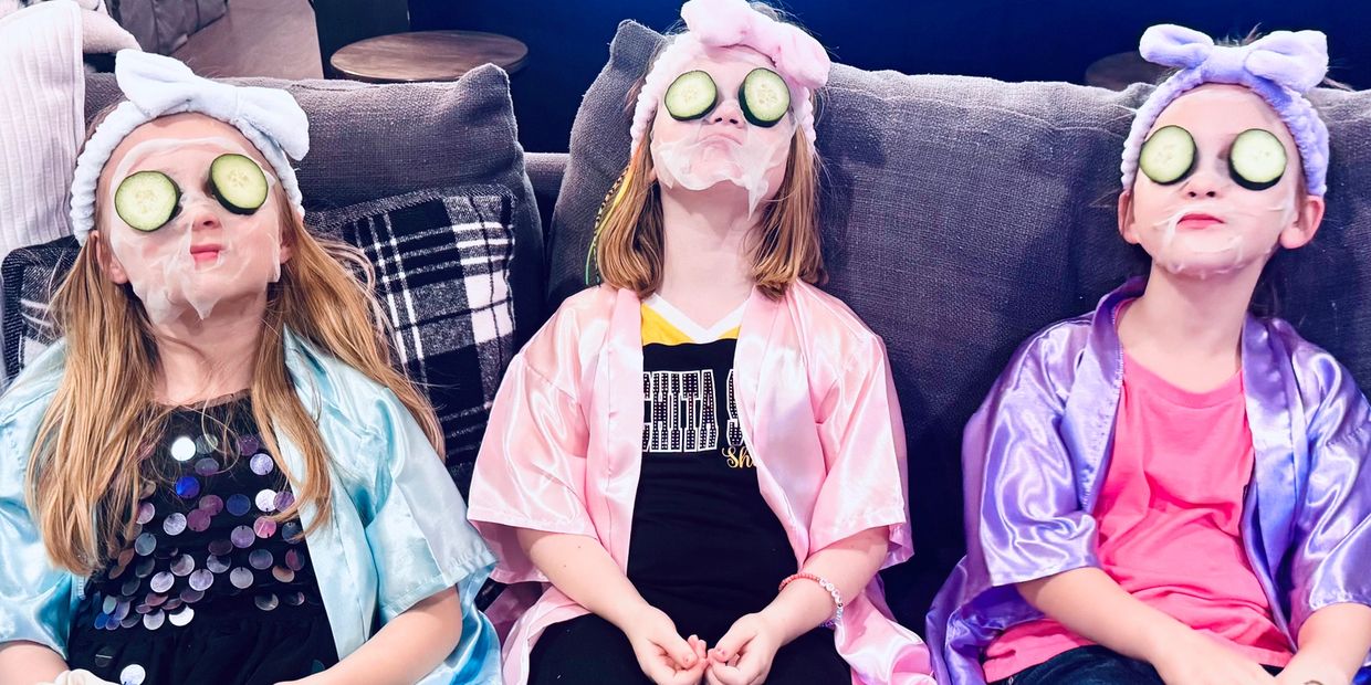 Girls with cucumbers on eyes birthday spa slumber party in greater Wichita, KS area