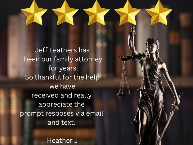 A statue of justice with five stars and the quote