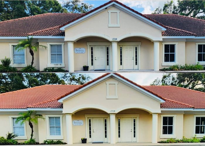 Stack of books next to pencils in a holder and a camera.