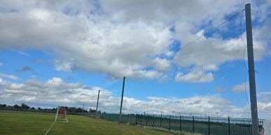 Netting installed behind football goals