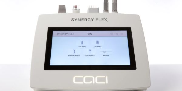 CACI Synergy Flex aesthetic device with digital screen.