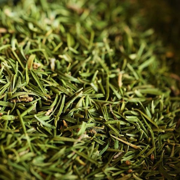 Close-up of dried green herbs.