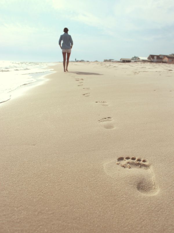 Woman walking on the beach