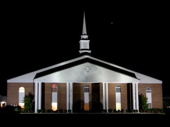 Night photo of front of Belden Baptist Church