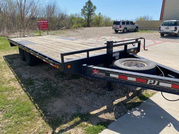 Trailer rental: Open deck heavy duty trailer rental. 