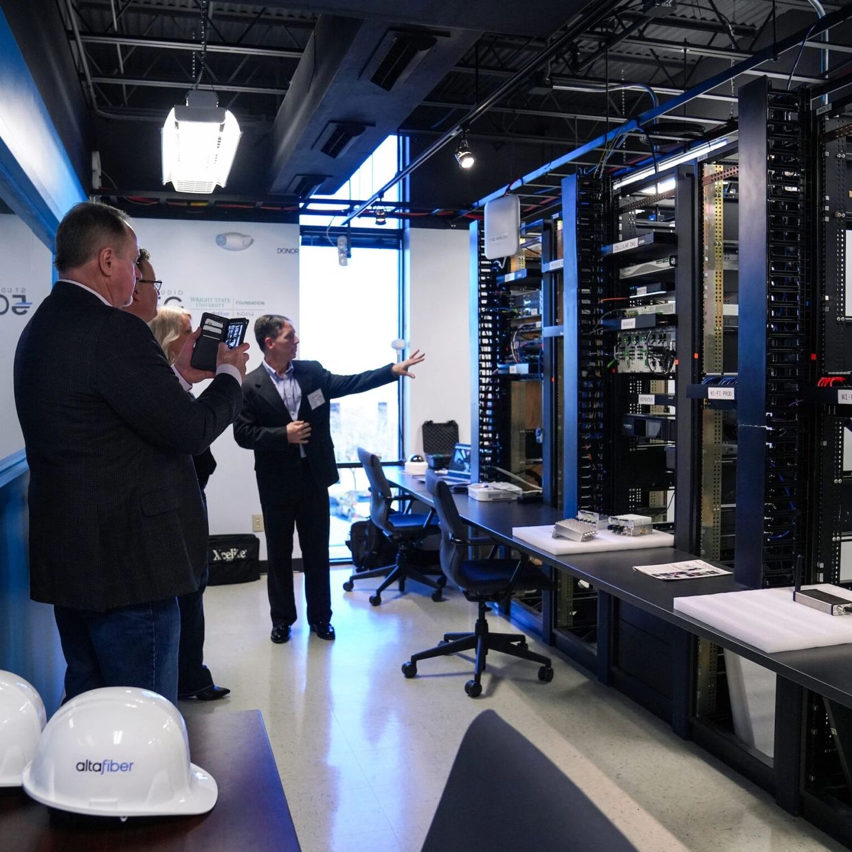 Reception guests explore Studio 5G server room.