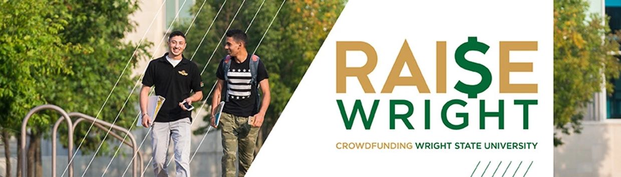 Two students walking on campus promoting crowdfunding for Wright State University.
