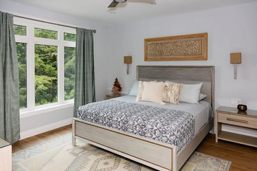 The king bedrooms feature luxurious bedding to ensure a comfortable cottage vacation.
