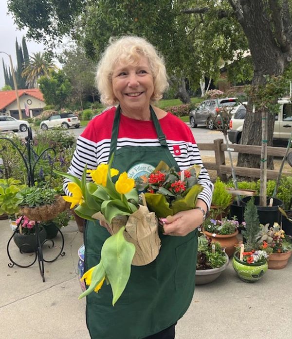 One of our members with some of our plants for sale.
