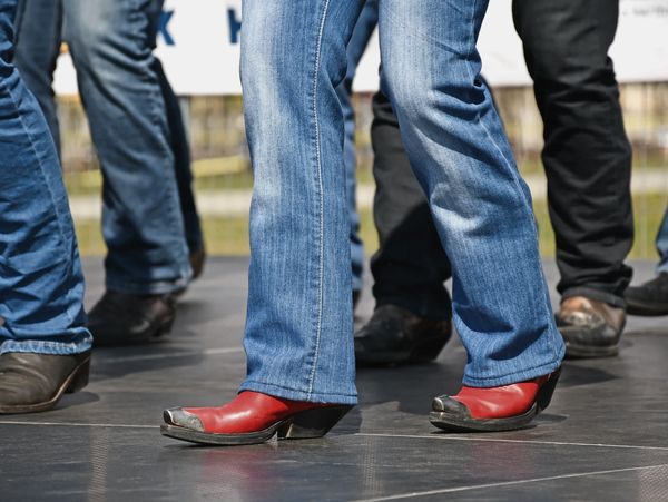 Jeans and Cowboy Boots in the middle of a country line dance
