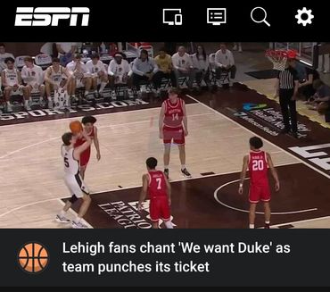 Lehigh basketball players in action with fans chanting for Duke.