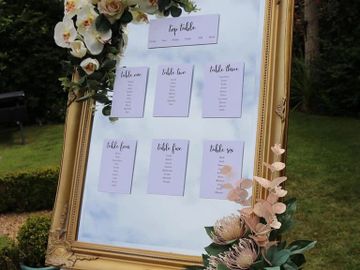 vintage mirror with gold frame mounted on a vintage easel, for table plans. for hire west sussex