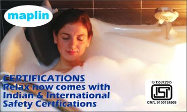 Woman relaxing in a bubble bath with safety certification advertisement.