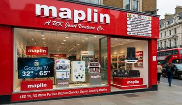 Maplin electronics store front with bright red signage on a city street.