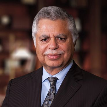 President Khalid Muneer