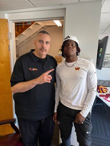 Monk and Jacory "Bill" Croskey-Merritt at the dealership Community Appreciation Event - May 2026.