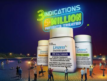 Giant Linzess medication bottles under neon sign about 5+ million patients treated.