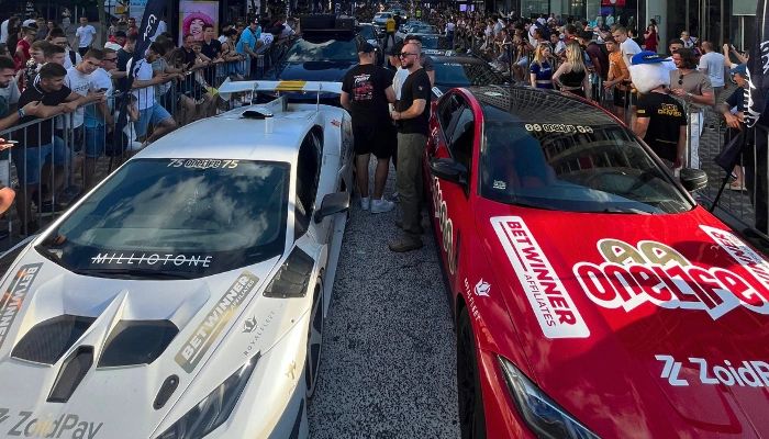 amperghini's Lamborghini Urus at a high-energy rally in Slovenia, surrounded by a massive crowd and supercars like a Ferrari and Porsche. This world-traveling Lamborghini Urus has crossed countries and continents, capturing the thrill of global automotive adventures. Follow Camperghini’s journey of luxury travel, exotic car rallies, and epic road trips around the world.