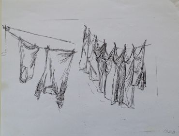 Sketch of clothes hanging on a line.