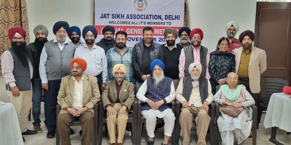 Group photo of Jat Sikh Association members at a general meeting in Delhi.