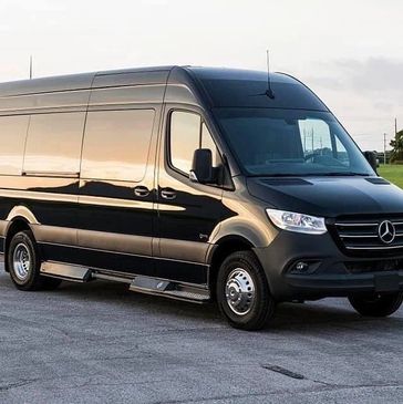 alt="black limousine sprinter party bus"