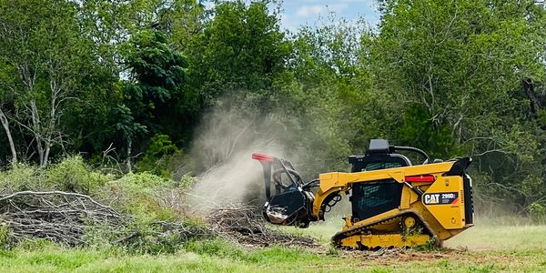 Mulching a large brush pile