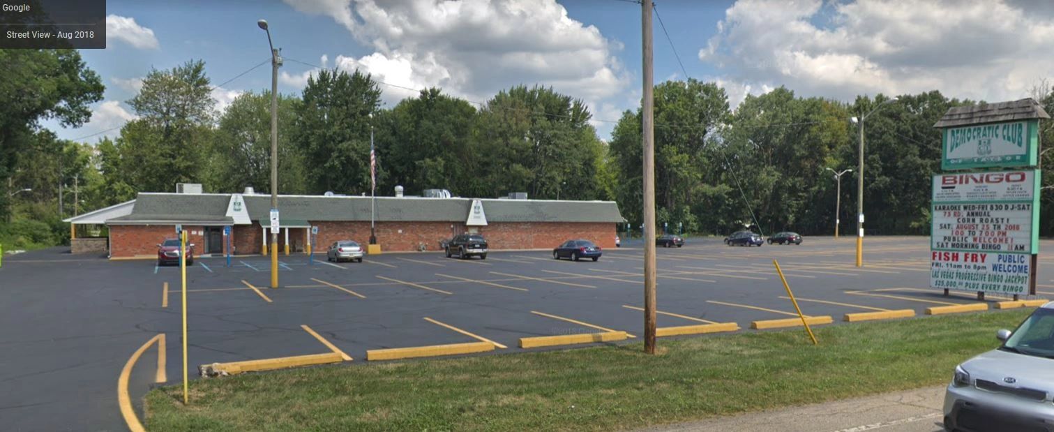 Membership club room with a patio and a Bingo hall playing 9 times a week with a large parking lot. 