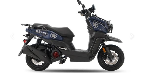 Side view of a compact navy blue scooter with star decals.