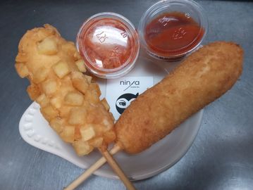 Choose: Mozzarella Corn Dogs  with potato bites or Mozzarella with 1/2 cheese and hot dogs $8 each.