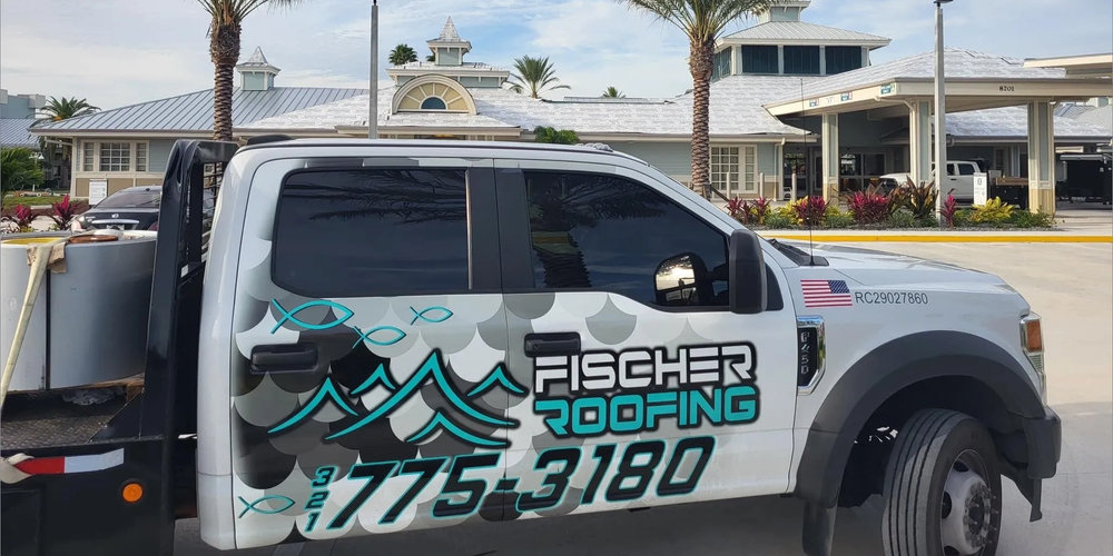 Fischer Roofing truck on the job in Brevard County, Florida
