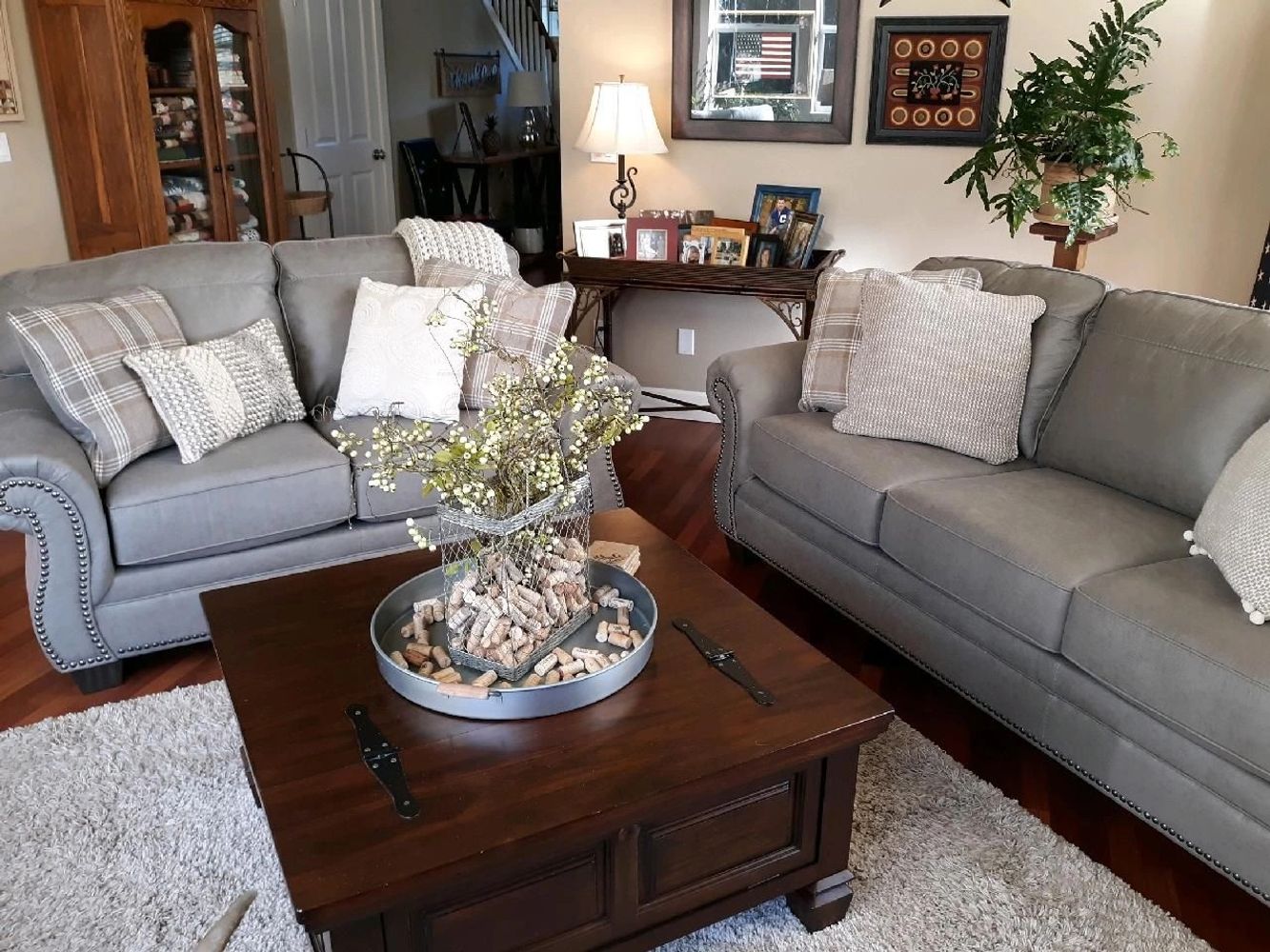 Cozy family great room with SW 9111 Antler Velvet walls with gray furniture.
