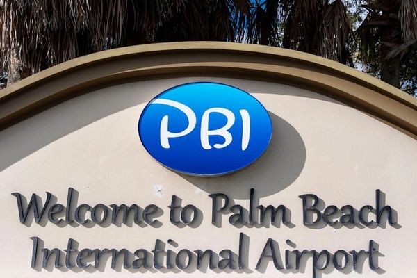 Sign welcoming visitors to Palm Beach International Airport.