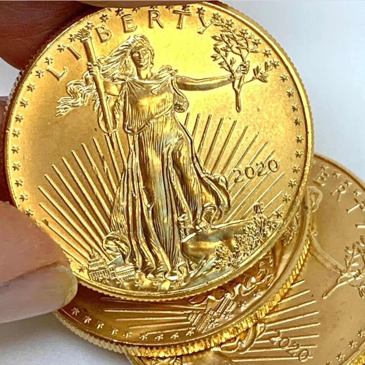 American gold eagles depicting one of the most beautiful designs, originally on the $20 gold piece. 