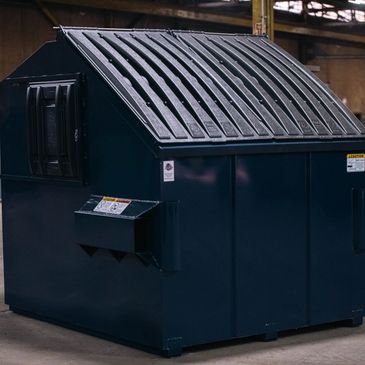 Navy blue front-load dumpster fabricated by Elite Containers