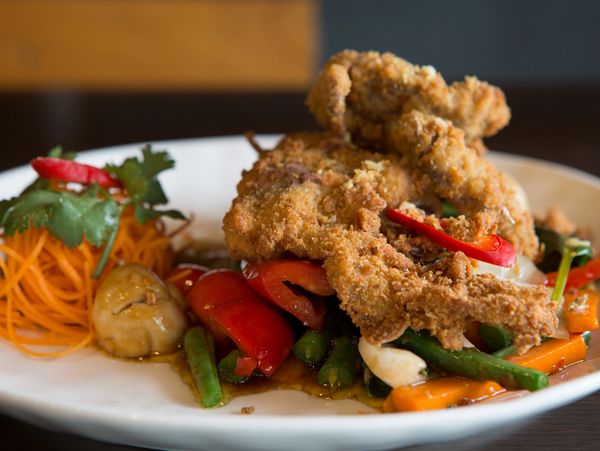 Crispy fried fish with vegetables.