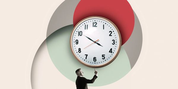 Man pointing at a clock face