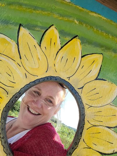 Kim in the sunflower cut-out.