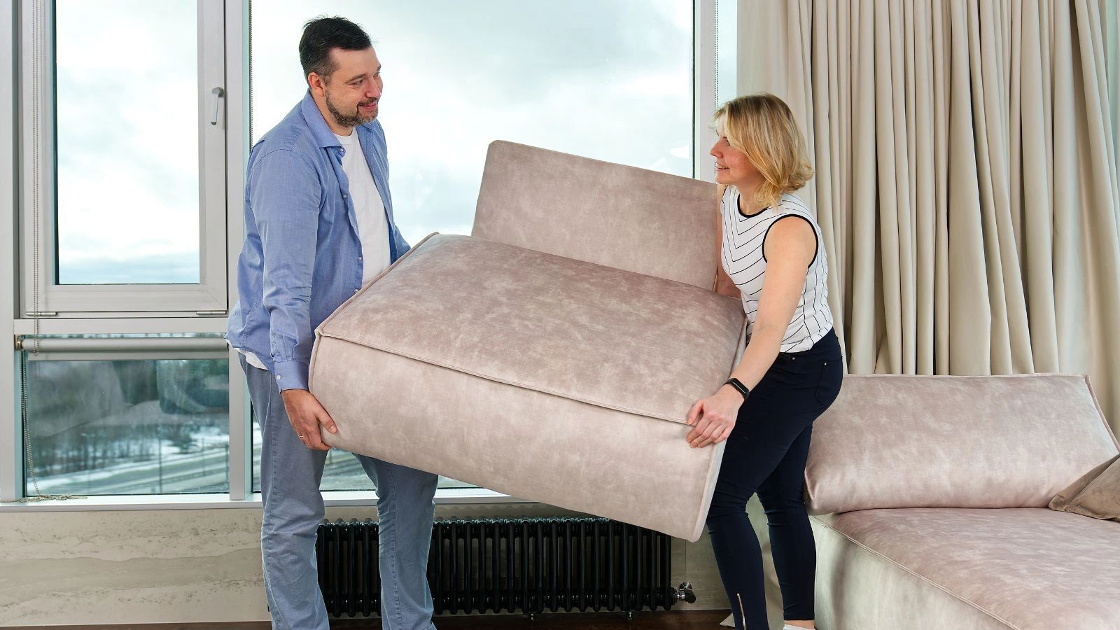 Professional furniture movers at work