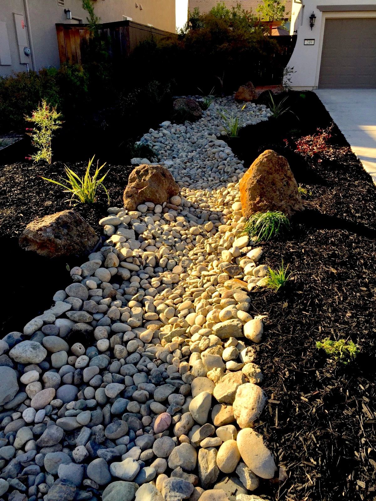 Use our random cobble to create dry river beds. 