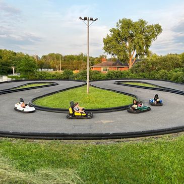 Group of people riding go-karts on the best track.